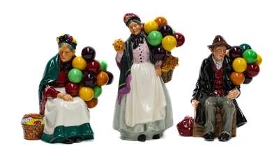 Lot 62 - Royal Doulton figures: The Old Balloon Seller,...