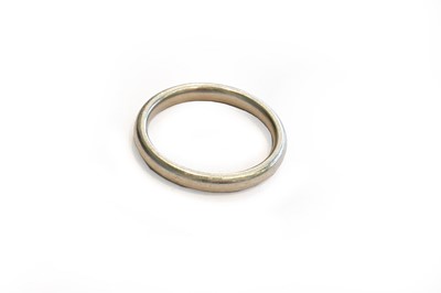 Lot 263 - A platinum band ring, finger size Q