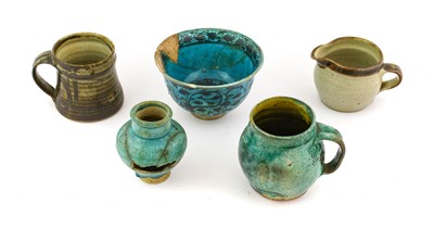 Lot 224 - A Kashan Turquoise-Glazed Earthenware Bowl,...