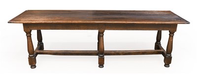 Lot 784 - A Joined Oak Refectory Style Dining Table, in...