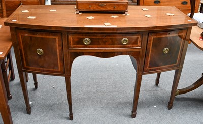 Lot 1188 - A George III mahogany bow front sideboard,...