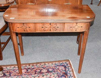 Lot 1136 - A George III mahogany foldover tea table, 91cm...