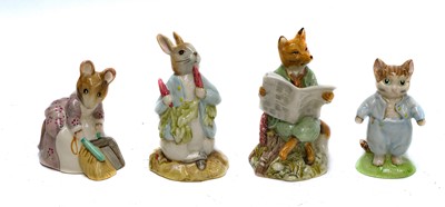 Lot 318 - Fourteen Beatrix Potter figures (boxed) - Nine...