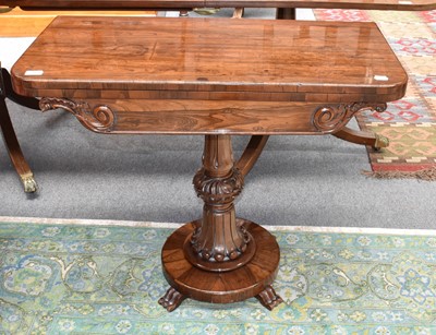 Lot 1185 - A William IV rosewood fold over tea table,...