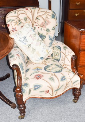 Lot 1141 - A Victorian buttoned back armchair with carved...