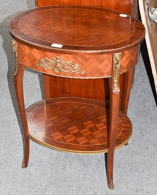 Lot 1302 - A French kingwood parquetry inlaid two tier...