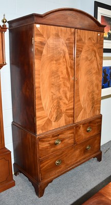 Lot 1100 - A George III Inlaid mahogany linen press...