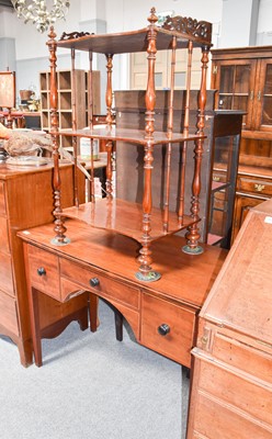 Lot 1128 - A Victorian mahogany three-tier whatnot with...