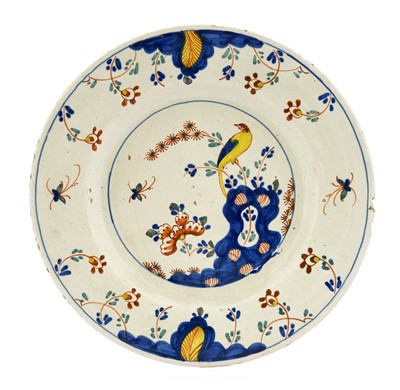 Lot 77 - An English Delft Plate, circa 1760, painted in...