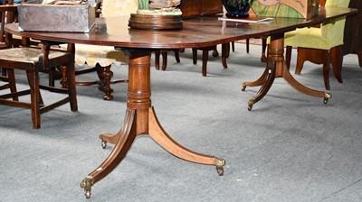 Lot 1143 - A 19th century mahogany twin pillar dining...