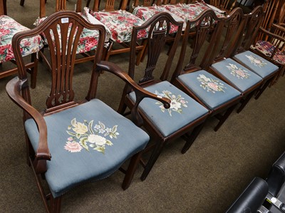 Lot 1234 - A set of four George III mahogany dining...