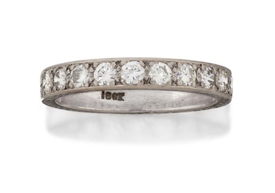 Lot 2156 - A Diamond Half Hoop Ring