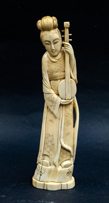 Lot 294 - A Japanese Meiji period carved ivory okimono...