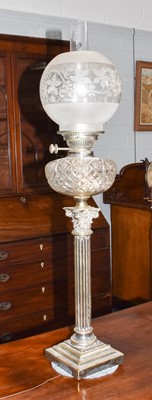 Lot 1170 - A silver plated Corinthian column oil lamp