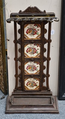 Lot 1275 - A late 19th century cast iron and tile...