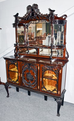 Lot 1209 - An Edwardian mirrored and carved sideboard,...