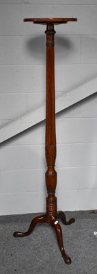 Lot 1210 - A 19th century slender torchere with reeded...