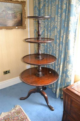 Lot 1163 - A George III Mahogany Dumb Waiter, circa 1800, of four circular graduated tiers, raised on cabriole