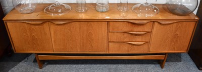 Lot 1255 - A 1960s Nathan teak sideboard comprising three...