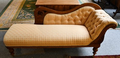 Lot 1259 - A Victorian deep buttoned chaise longue on...