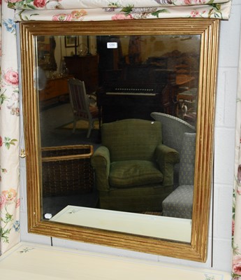 Lot 1290 - A 19th century wall mirror in reeded gilt wood...