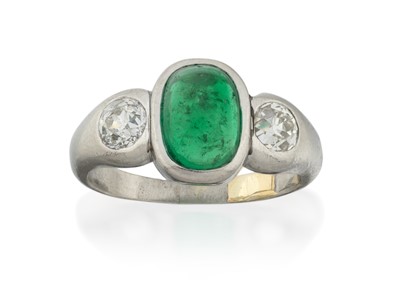 Lot 2285 - An Emerald and Diamond Three Stone Ring
