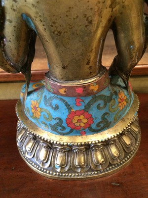 Lot 152 - A Sino-Tibetan Gilt Bronze and Cloisonne...