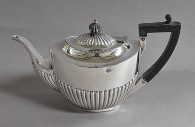 Lot 10 - A Victorian Silver Teapot, by John and William...