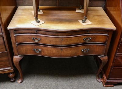 Lot 1241 - A 19th century mahogany serpentine fronted two...