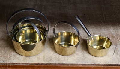 Lot 344 - A collection of 19th century brass pans to...