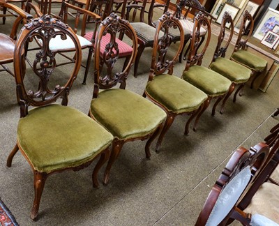 Lot 1253 - A set of six Victorian carved walnut balloon...