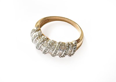 Lot 186 - A 9 carat gold diamond half hoop ring, finger...