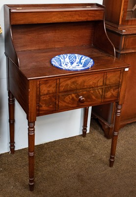 Lot 1322 - A Victorian mahogany washstand with ebony...