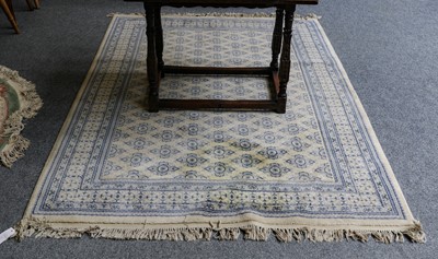 Lot 1013 - A Chinese needlepoint rug, the indigo field of...