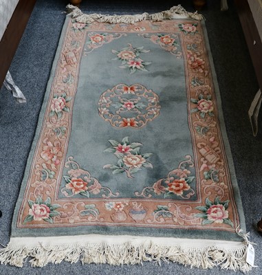 Lot 1013 - A Chinese needlepoint rug, the indigo field of...