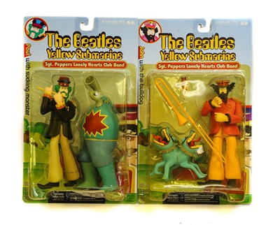 Lot 14 - McFarlane Toys The Beatles Feature Film Figures