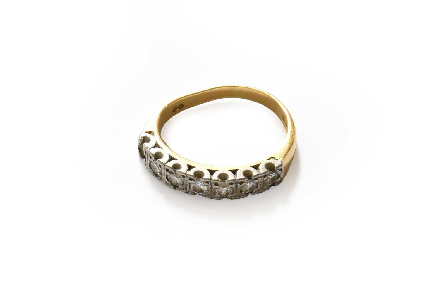 Lot 207 - An 18 carat gold seven stone diamond ring (a.f.)