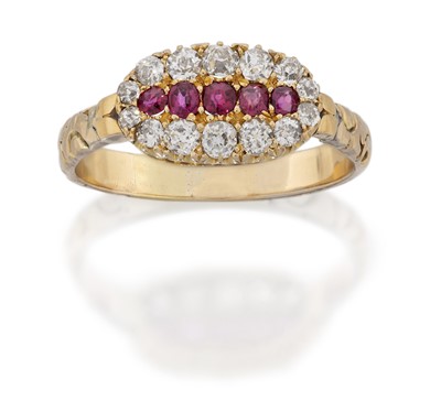 Lot 2051 - A Ruby and Diamond Cluster Ring