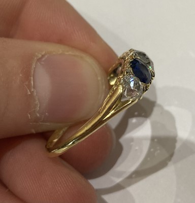 Lot 2304 - A Sapphire and Diamond Five Stone Ring