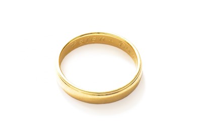 Lot 196 - A band ring, stamped '750', finger size P