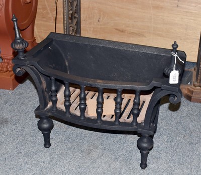 Lot 1325 - Cast iron fire basket with urn shaped finials,...