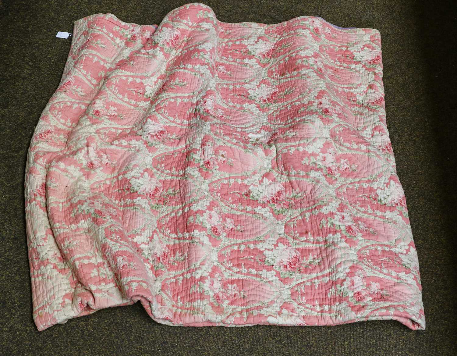 Lot 278 - Early 20th century pink floral cotton quilt,...