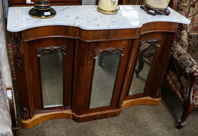 Lot 1273 - A Victorian rosewood marble top break front...