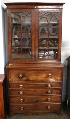 Lot 1309 - A Regency Mahogany and Ebony-Strung Secretaire...