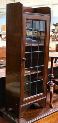 Lot 1232 - A slender mahogany floor standing bookcase...