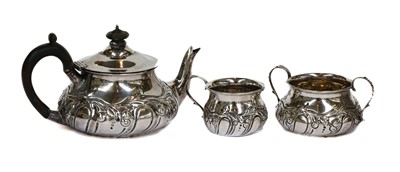 Lot 55 - An Edwardian silver three-piece morning tea...