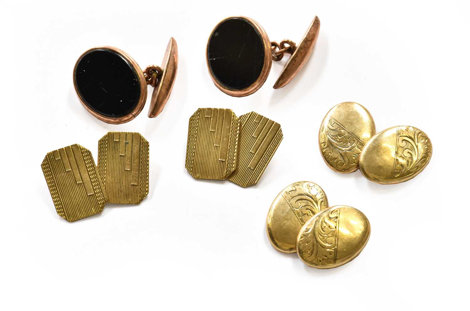 Lot 210 - Two pairs of 9 carat gold cufflinks; and a...