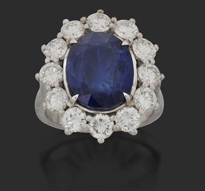 Lot 2356 - An 18 Carat White Gold Sapphire and Diamond Cluster Ring