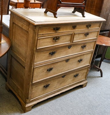 Lot 1286 - A 19th century limed oak straight front chest...