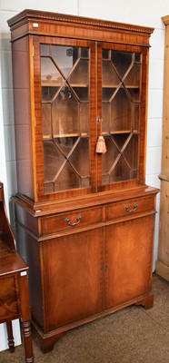 Lot 1266 - A reproduction mahogany bookcase, 92cm by 39cm...